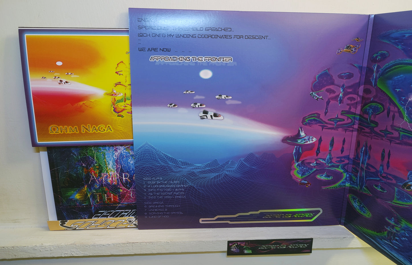 OhmNaga - Approaching the Frontier - Deluxe Glow-in-Dark UV Vinyl Gatefold LP and 11"x11" Art Folio - Limited 1st and LAST UV Vinyl Pressing of 500 Copies