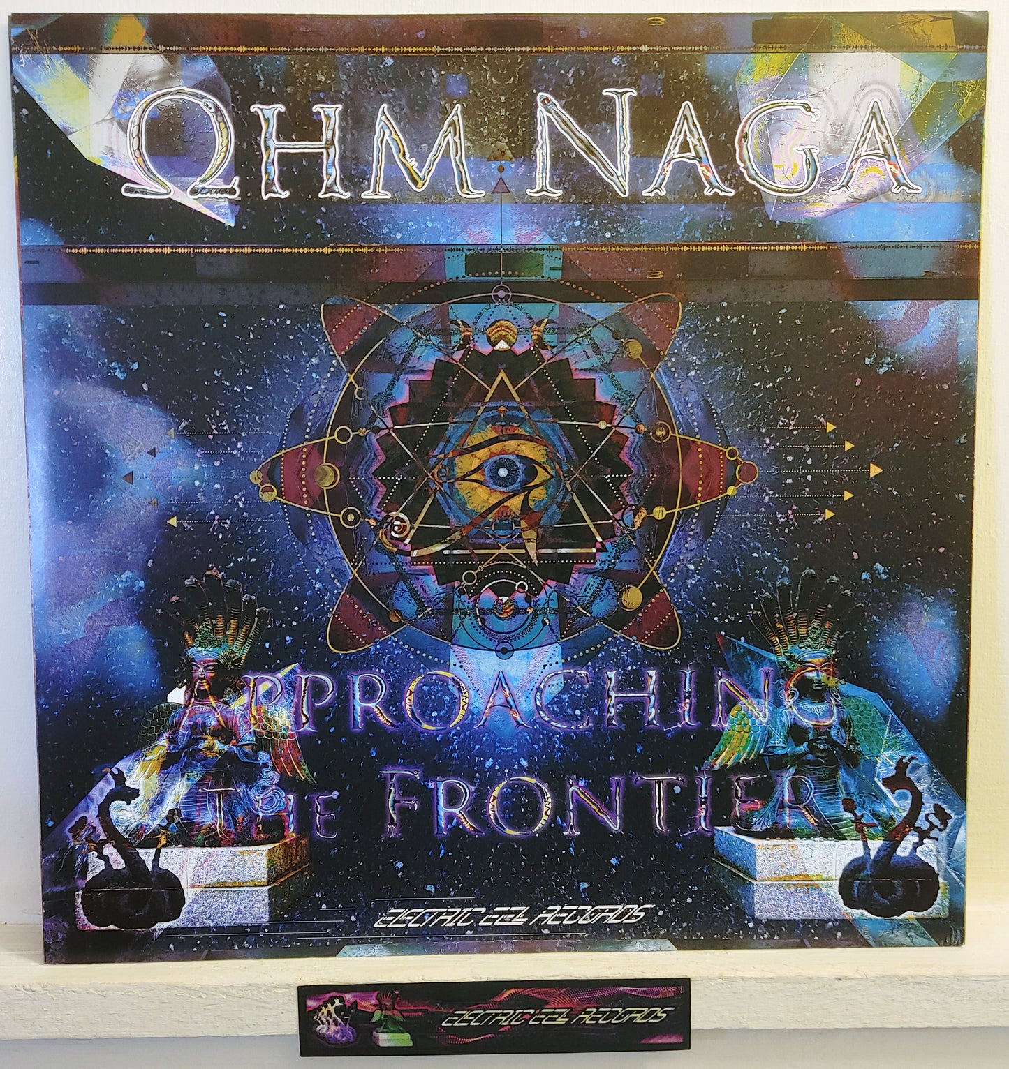 OhmNaga - Approaching the Frontier - Deluxe Glow-in-Dark UV Vinyl Gatefold LP and 11"x11" Art Folio - Limited 1st and LAST UV Vinyl Pressing of 500 Copies